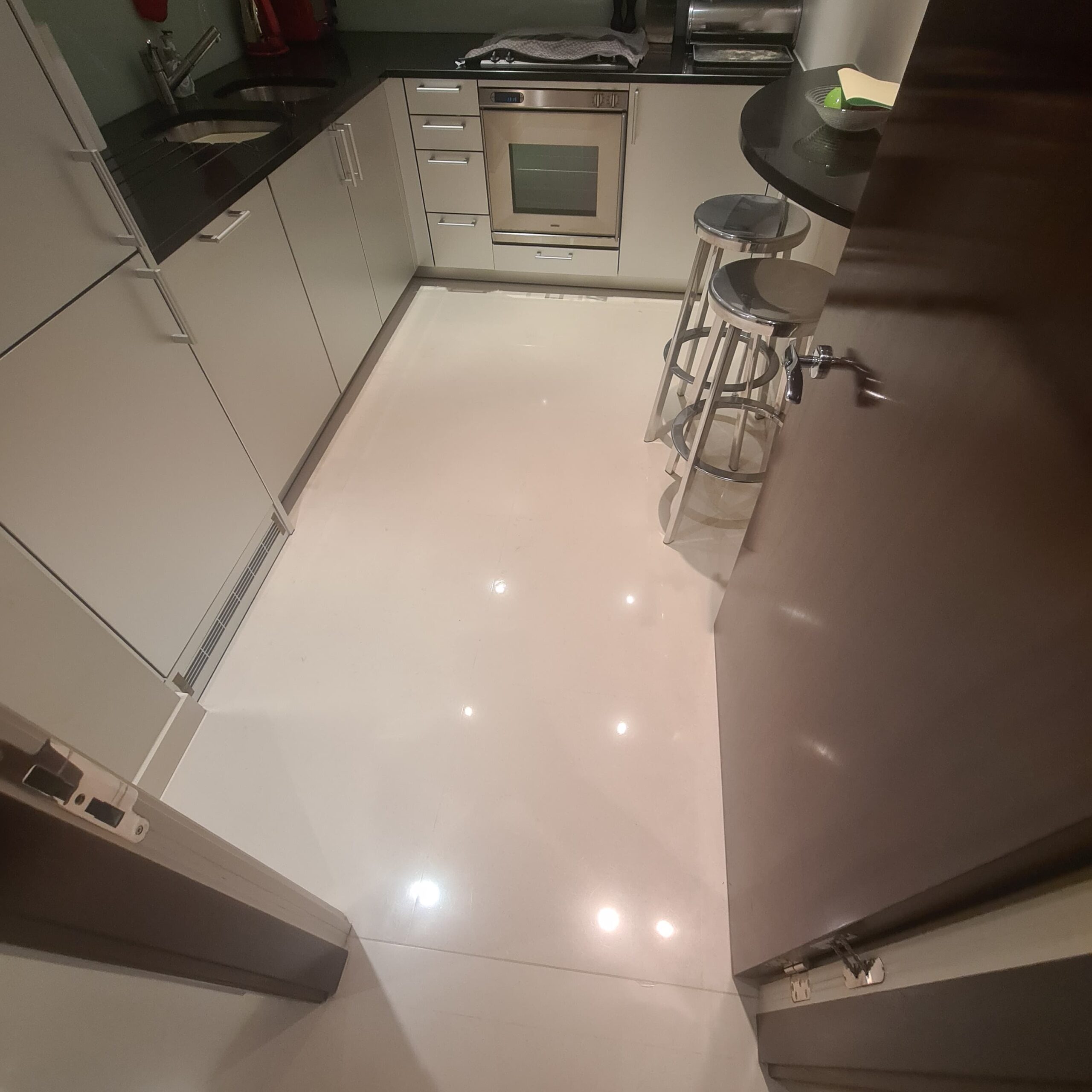 polished marble kitchen floor in Guildford